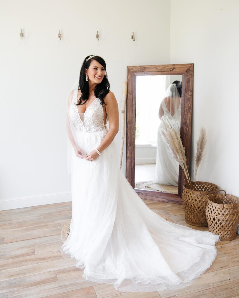 bride smiling in flowy gown