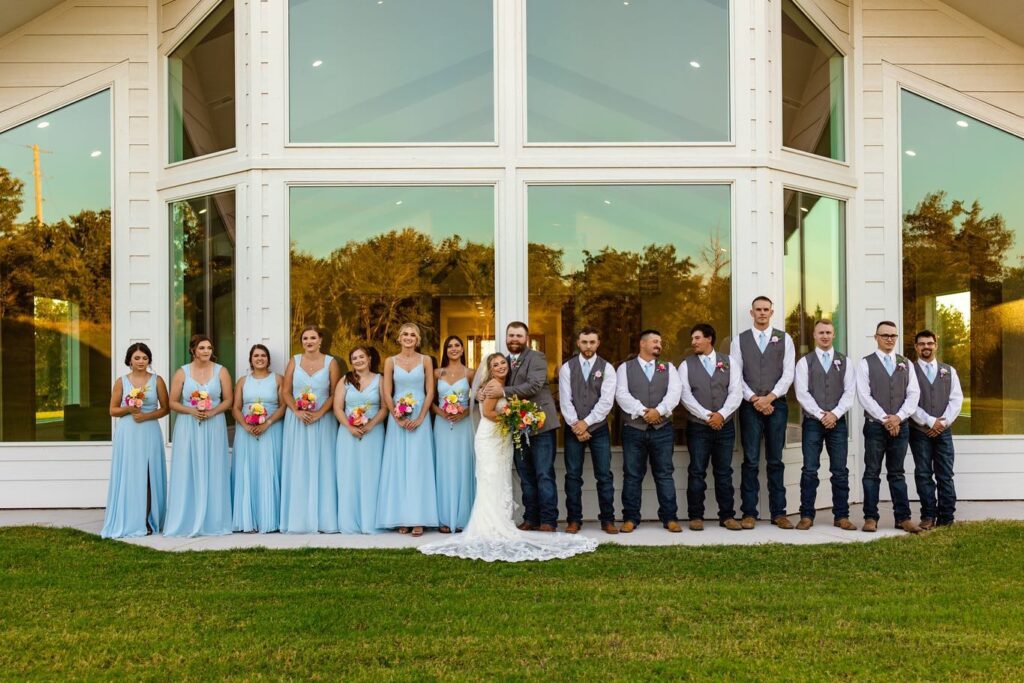bride and groom with wedding party