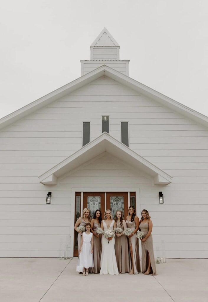 bride and bridesmaids in gold gowns